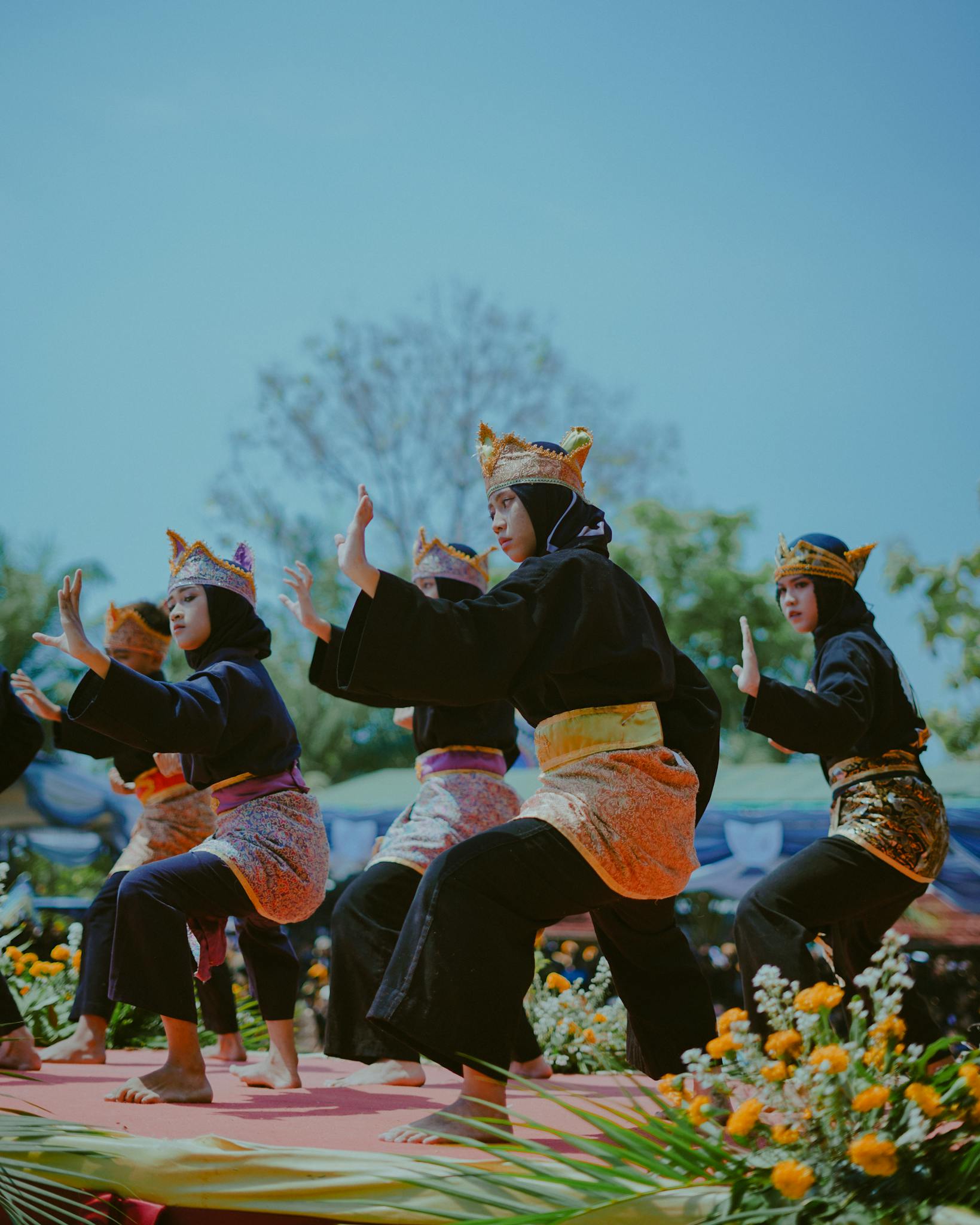 Vibrant cultural dance by children in traditional attire, Madiun, Indonesia.